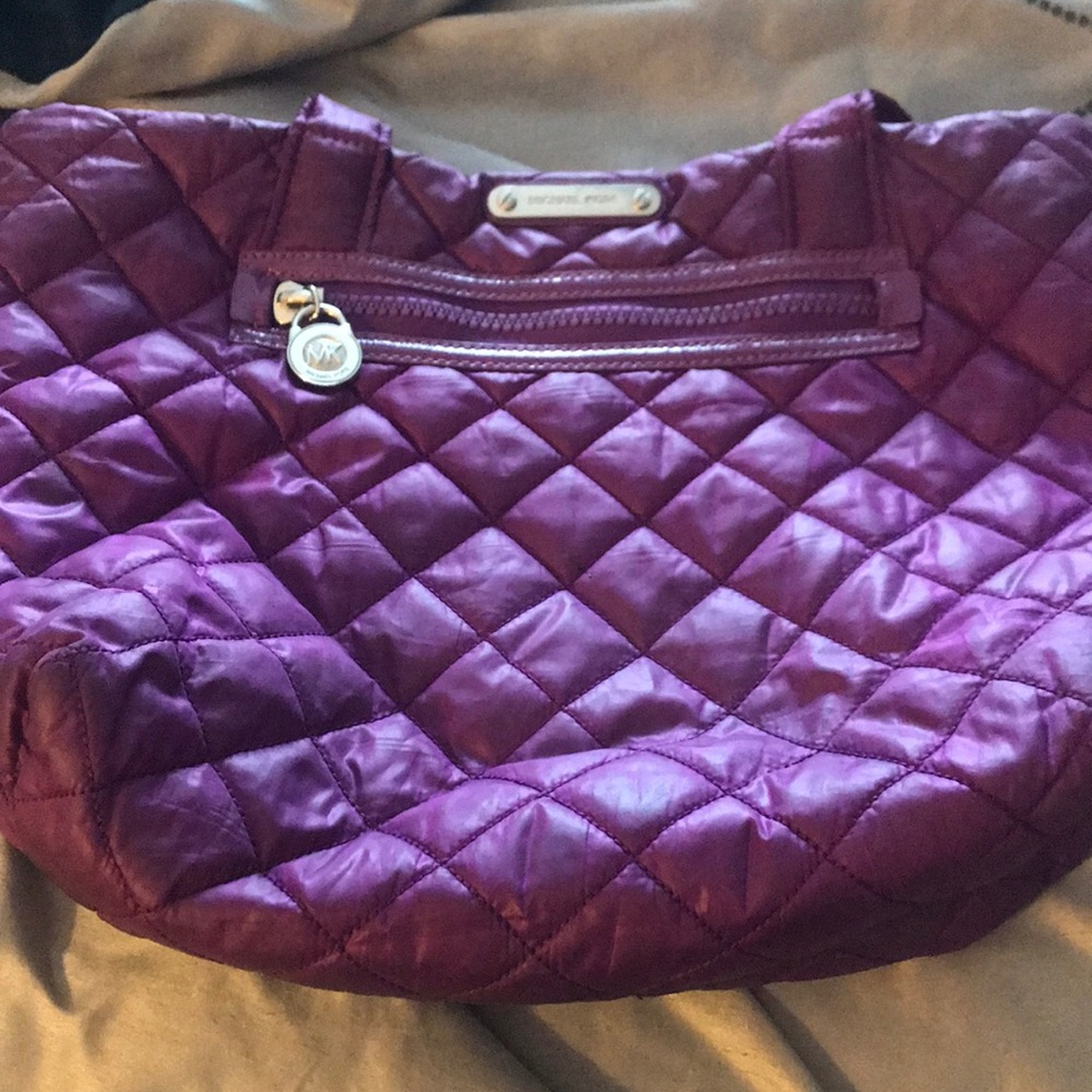 Purple quilted Michael Kors purse